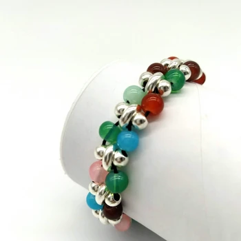 

Women's bracelet colorful beads mixed with silver, 18 cm long.
