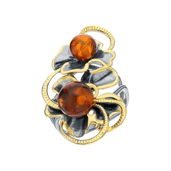 

Silver ring with amber sunlight