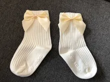 Bebé recién nacido acanalado liso nudo de lazo calcetines bebés pequeños niñas niños otoño no-Slip algodón suave lindo calcetines 0-3Y