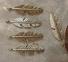 20 unids / lote dijes de plumas colgantes de plumas joyería que hace dijes de plumas para hacer pulseras Color plata antigua