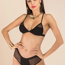 Черный купальник с перфорацией