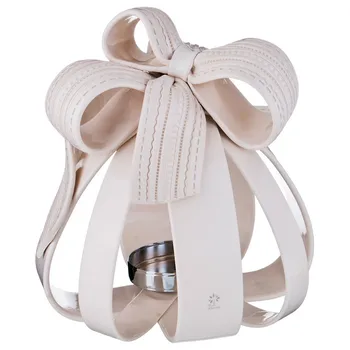 

Candlestick "knitted bow" height = 31,5 cm.