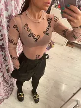 Verano de 2020 letra impresa Sexy transparente bodis de malla de manga larga ver a través de bebé Bodycon cortos mujeres monos
