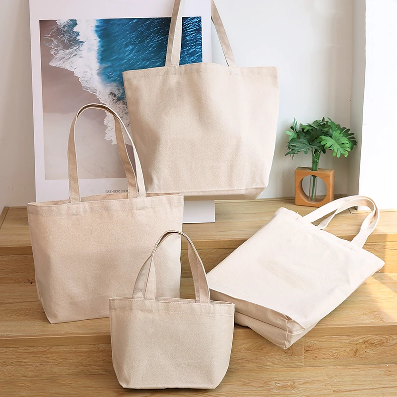 バッグ LOGO CANVAS TOTE BAG / NATURAL Canvas Tote Bag with logo print by Oriental