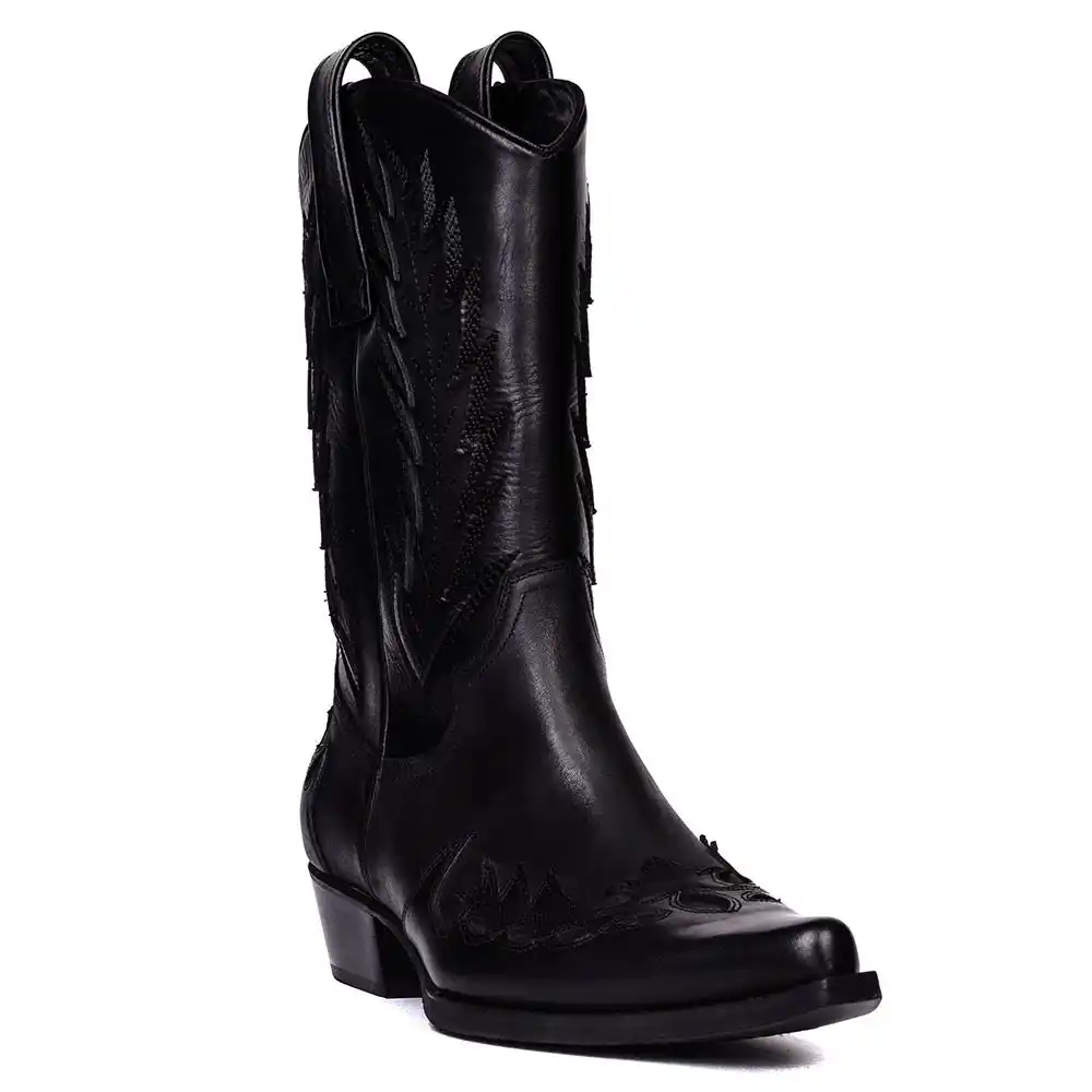 black cowboy boots with white stitching