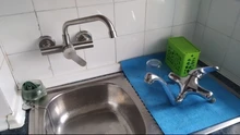 SUS304 Acero inoxidable caliente y Grifo de Agua Fría montado en la pared grifo de fregadero de cocina de doble Control