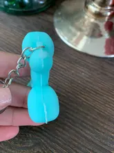 Nuevo creativo de dibujos animados globo de Llavero perro colgante anillo de hombres y mujeres par bolsa de llavero colgante venta al por mayor