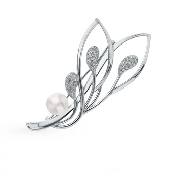 

Silver brooch with cubic zirconia and pearls sunlight sample 925