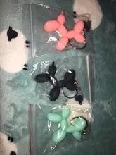 Nuevo creativo de dibujos animados globo de Llavero perro colgante anillo de hombres y mujeres par bolsa de llavero colgante venta al por mayor