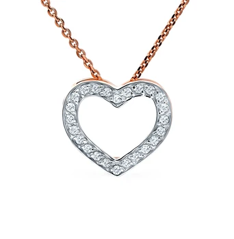 

Gold pendant with diamonds sunlight