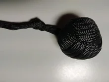 LLavero de seguridad para exteriores, cuerda de seguridad de autodefensa con rodamiento de bolas de acero negro Puño de mono