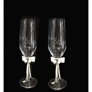 

Copas para boda, grabadas con los nombres de los novios y fecha de boda. Diseño actual. Acabado en lazo