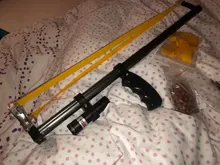 Catapulta tirachinas de alta precisión, barra recta telescópica de alta potencia, láser rojo, banda de goma plana de acero inoxidable para caza al aire libre