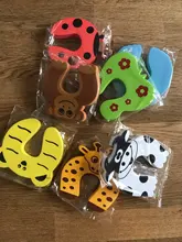 7 unids/lote la protección de la seguridad del bebé lindo Animal Tope de puerta de seguridad de bebé Tarjeta de bloqueo cuidado de recién nacido Niño dedo Protector