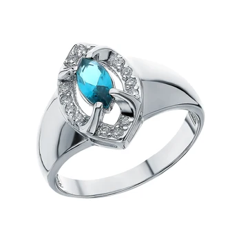 

Silver ring with topaz, cubic zirconia and jewelry glasses sunlight