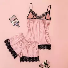 Vestido ajustado de fiesta con espalda al aire, vestido de mujer que estiliza la figura, corto, con tirantes muy finos y escote abierto