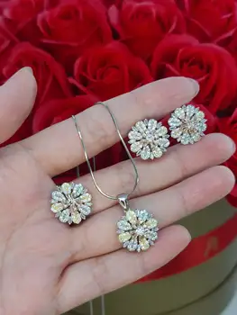 

Set of silver rhodium-plated matches with a chain
