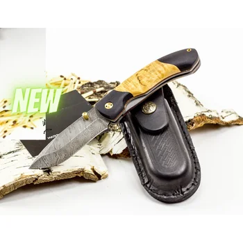 

Folding knife with Damascus steel blade and birch bark handle