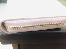 Carteras geométricas de lujo para mujer, monederos de cuero con cremallera, diseño de borla, billetera larga, monedero, tarjetero