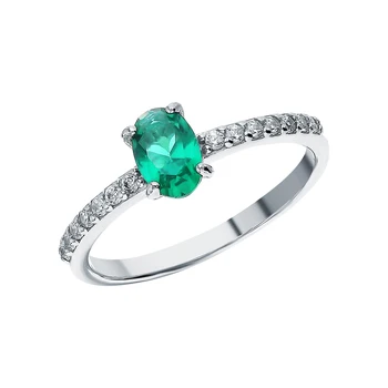 

Silver ring with cubic zirconia and emeralds synthetic sunlight sample 925