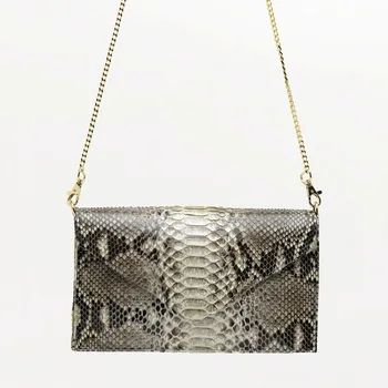 

TRENCADIS. Evening bag. Natural python snake skin Clutch