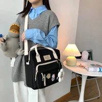 DCIMOR-mochila para niñas adolescentes multifuncional con hebilla de anillo, bolso de viaje portátil, mochila escolar pequeña, insignia