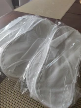 Zapatillas de viaje para Hotel para hombre y mujer, zapatos de uso doméstico, con punta cerrada esponjosa, desechables, Color sólido, 10 pares