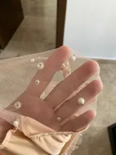 Blusa de manga larga ahuecada con volante elegante para otoño, camisa Sexy de malla transparente con cuentas y cuello redondo para mujer