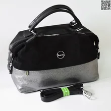 Обладает брендом, женская мягкая сумка