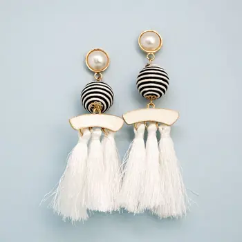 

Extravagant earrings with three white silk tassels (52490)