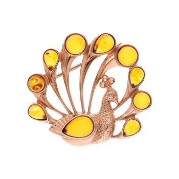 

Silver brooch with Amber artificial sunlight