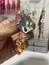 Pendientes con diseño de gato y ratón para mujer, aretes largos y salvajes con Clips para las orejas, joyería sencilla