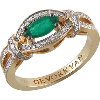 

Esthete ring with emerald and diamonds in Yellow Gold