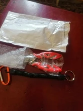 Alicates de pesca multifuncionales, tijeras de corte de línea, removedor de anzuelos, accesorios de abrazadera de pesca, herramientas con cordones, cuerda de resorte
