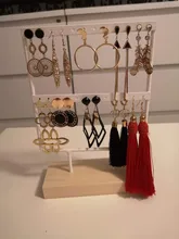 Soporte de exhibición para pendientes de tuerca de Metal con Base de madera, organizador de pendientes con 24/44/66 agujeros, venta al por mayor