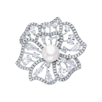 

Silver brooch with cubic zirconia and pearls cultured sunlight sample 925