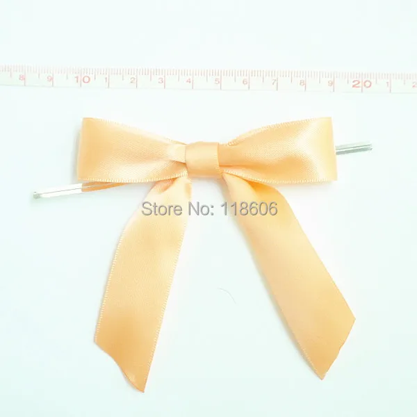peach satin ribbon gift bow.jpg