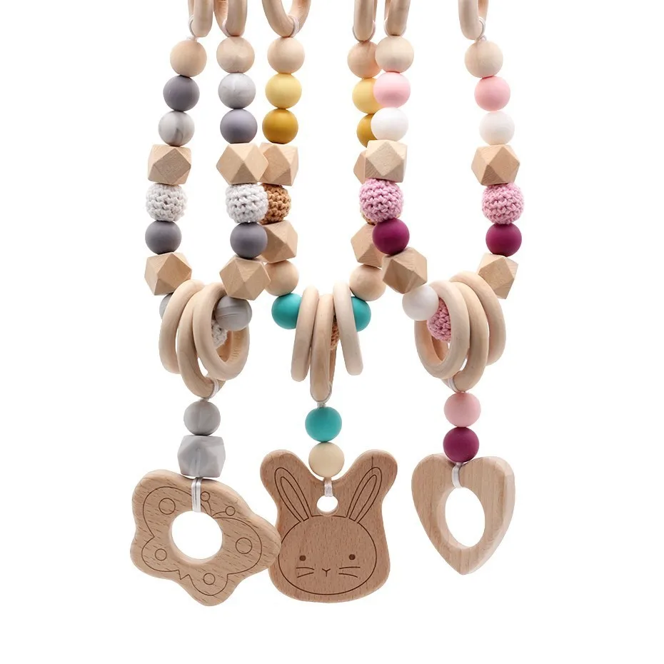 

New Fashion Teething Ring Baby Stroller Chain Crochet Ball Silicone And Natural Wood Beads Safe Teether Molars Necessary