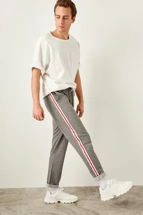 

Articulated Wheel Side Pockets Men's gray tracksuit bottom of striped pants TMNSS19VL0007