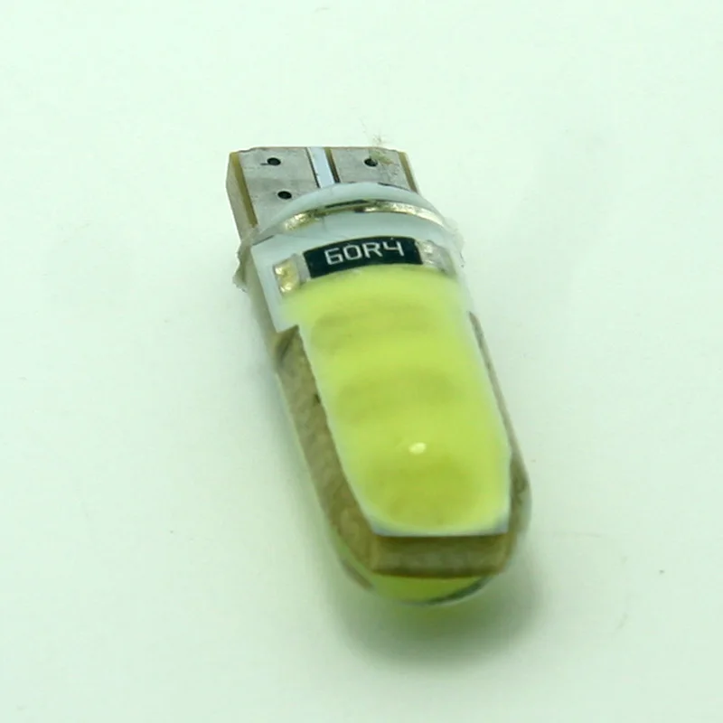 Более низкие цены 50 шт./лот 194 T10 Высокое качество COB 6 светодиодов 168 W5W силиконовый чехол с can-bus автомобильный фонарь освещения номерного знака