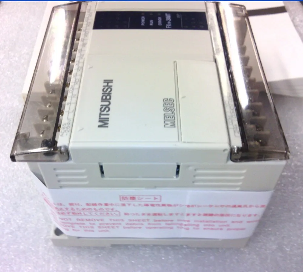 Mitsubishi FX1N-24MT контроллер движения с ЧПУ PLC может использовать для управления шаговой системой или сервосистемы управления легко и дешевле