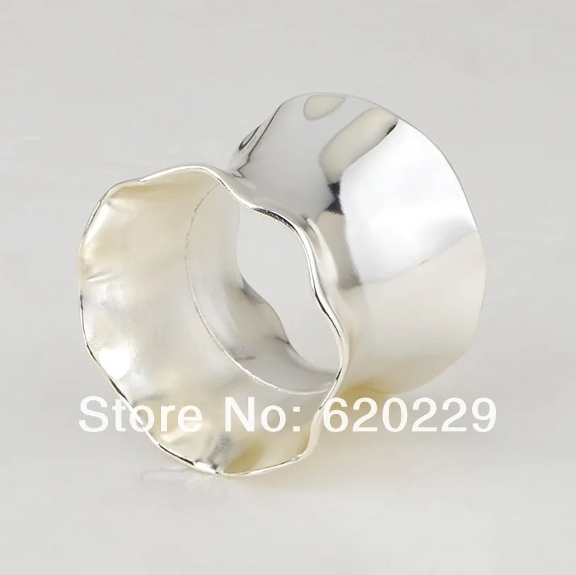 wave flower silver napkin holder.jpg