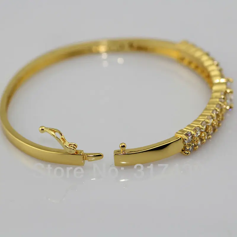 gold bangle bracelet with clasp