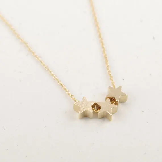 Gold Silver Trio Star Necklace.jpg