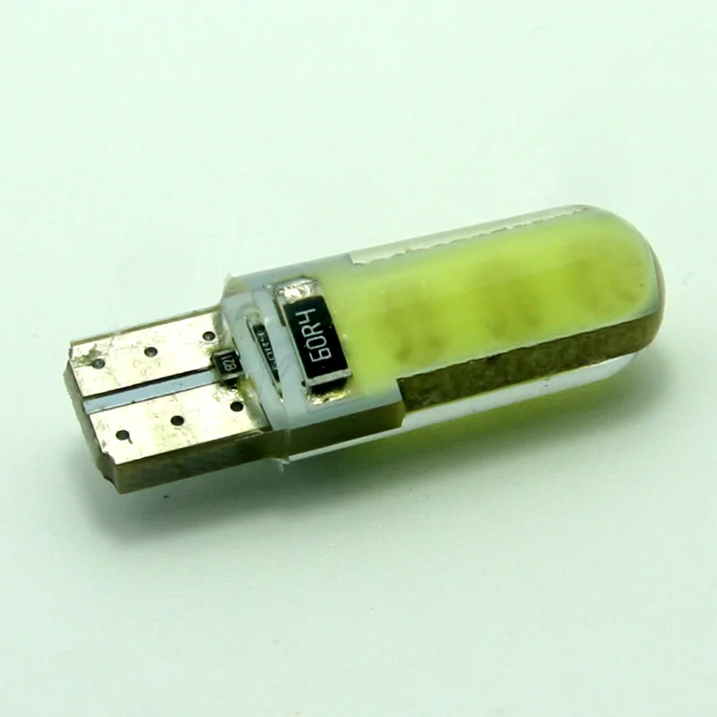 Более низкие цены 50 шт./лот 194 T10 Высокое качество COB 6 светодиодов 168 W5W силиконовый чехол с can-bus автомобильный фонарь освещения номерного знака