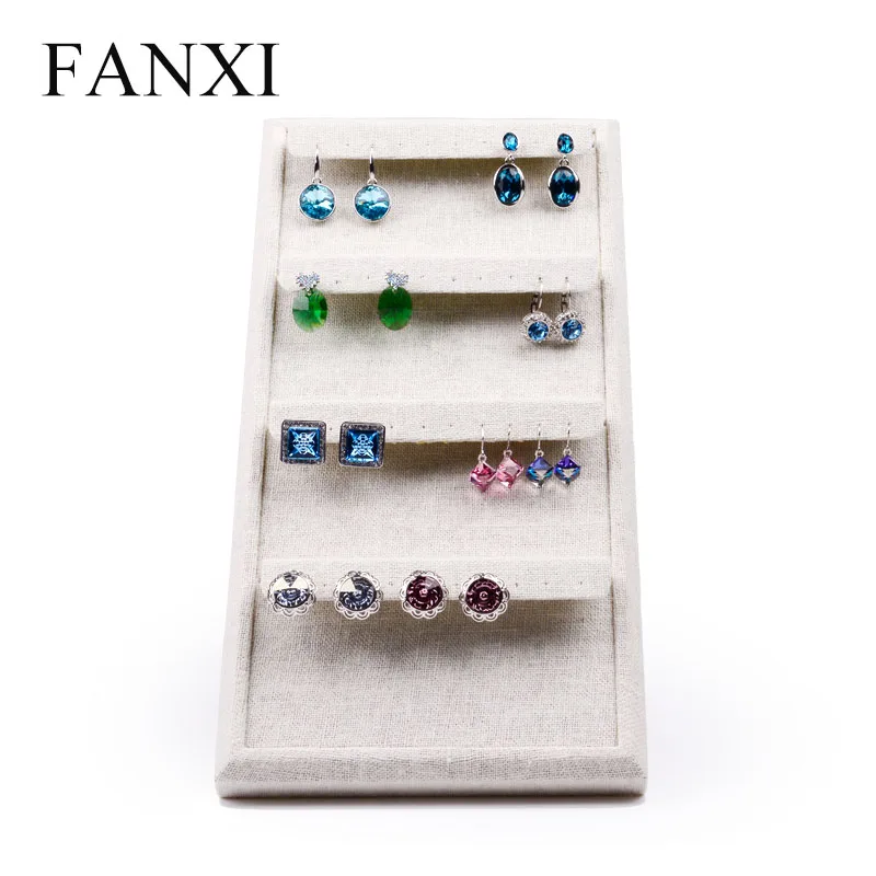 

2016 FANXI creamy white jewelry earring/ear stud received display warpped with thin linen fabric for counter shop