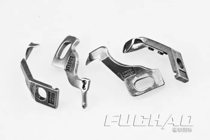 Для Singer 299 looper один набор из четырех частей(548232 548231 548207 548205