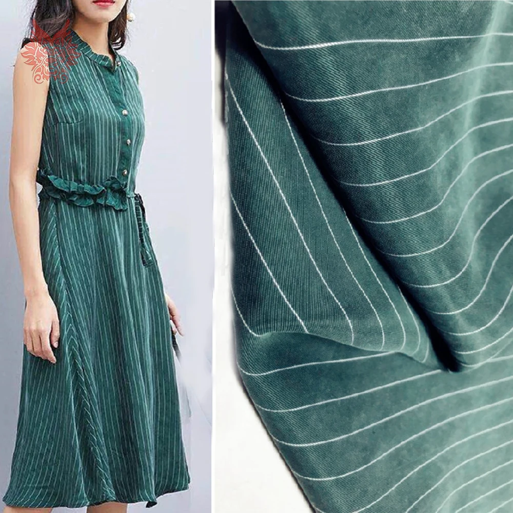 

Chinese cheap fabrc multi color stripe weighted 100% cupro sand washed fake silk fabric apparel for dress telas stoffen SP5532