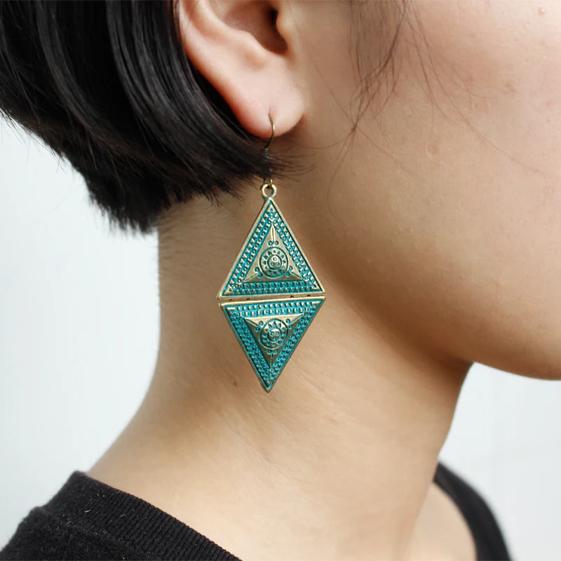 Bronze Symmetrical Triangle Rhombus Geometric Sun Totem Sunflower