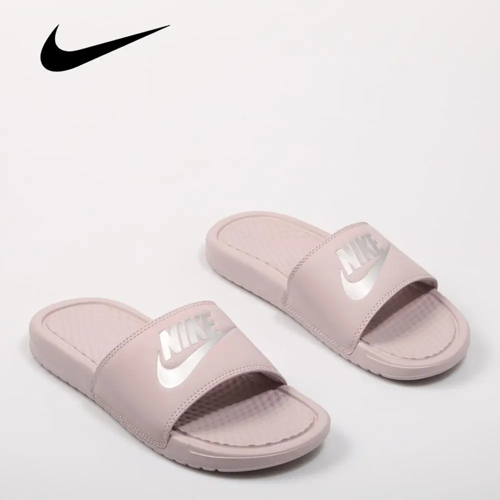 womens pink nike flip flops